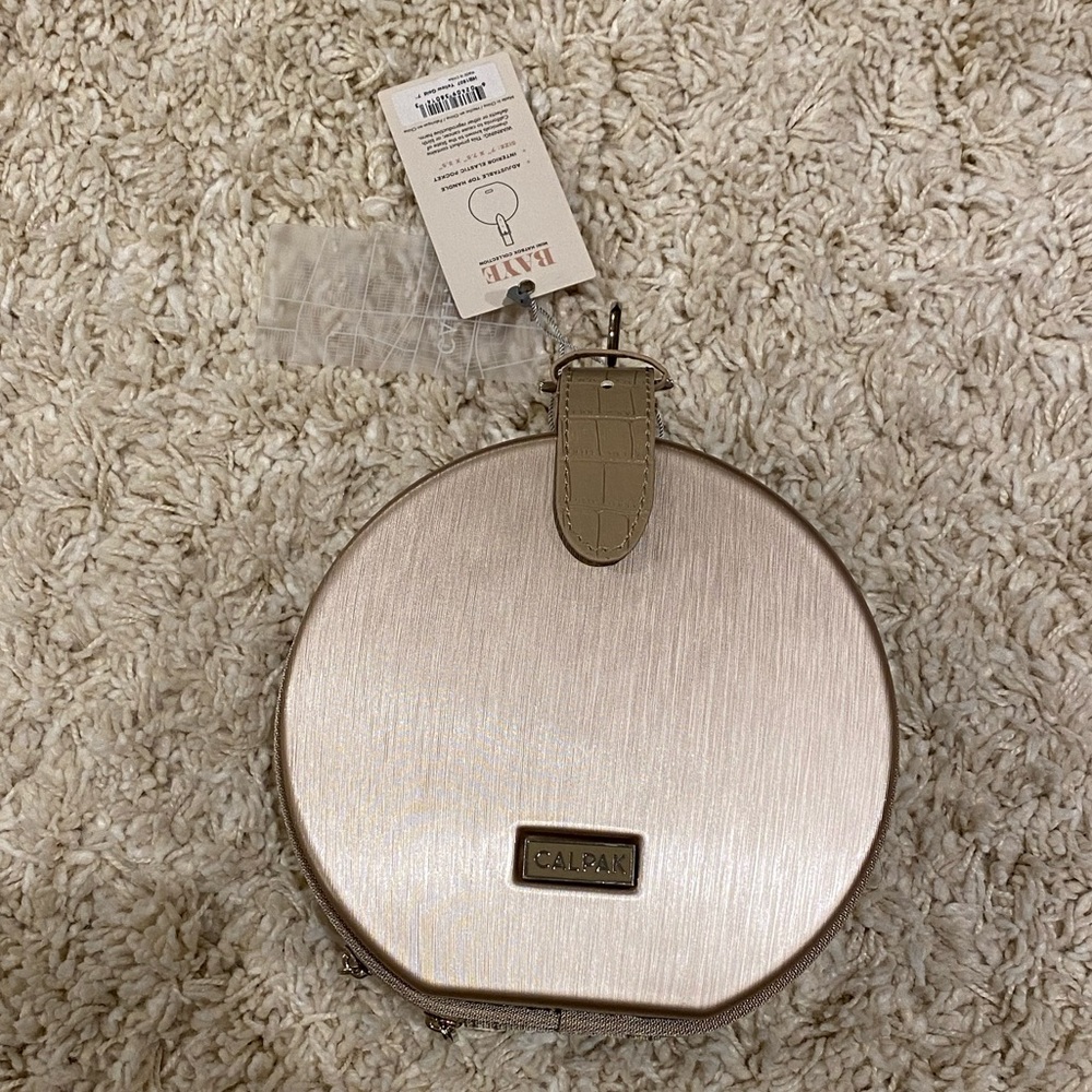 Calpak Rose Gold Round Crossbody Bag